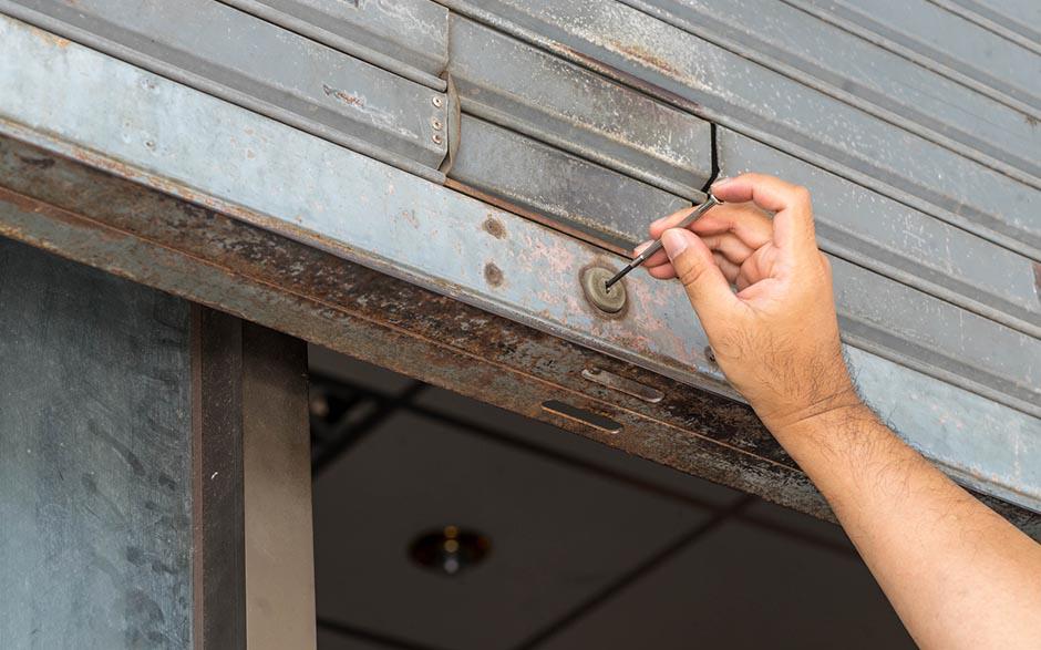 changer barillet porte garage basculante Alfortville